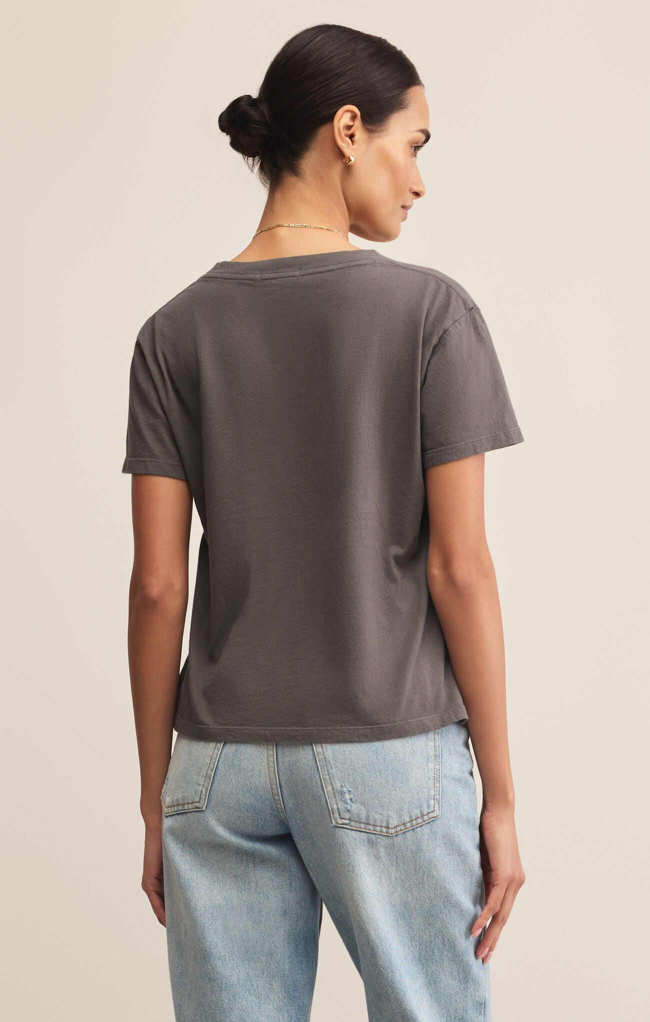 Back view highlighting relaxed fit of WEEKDAYS V-NECK TEE