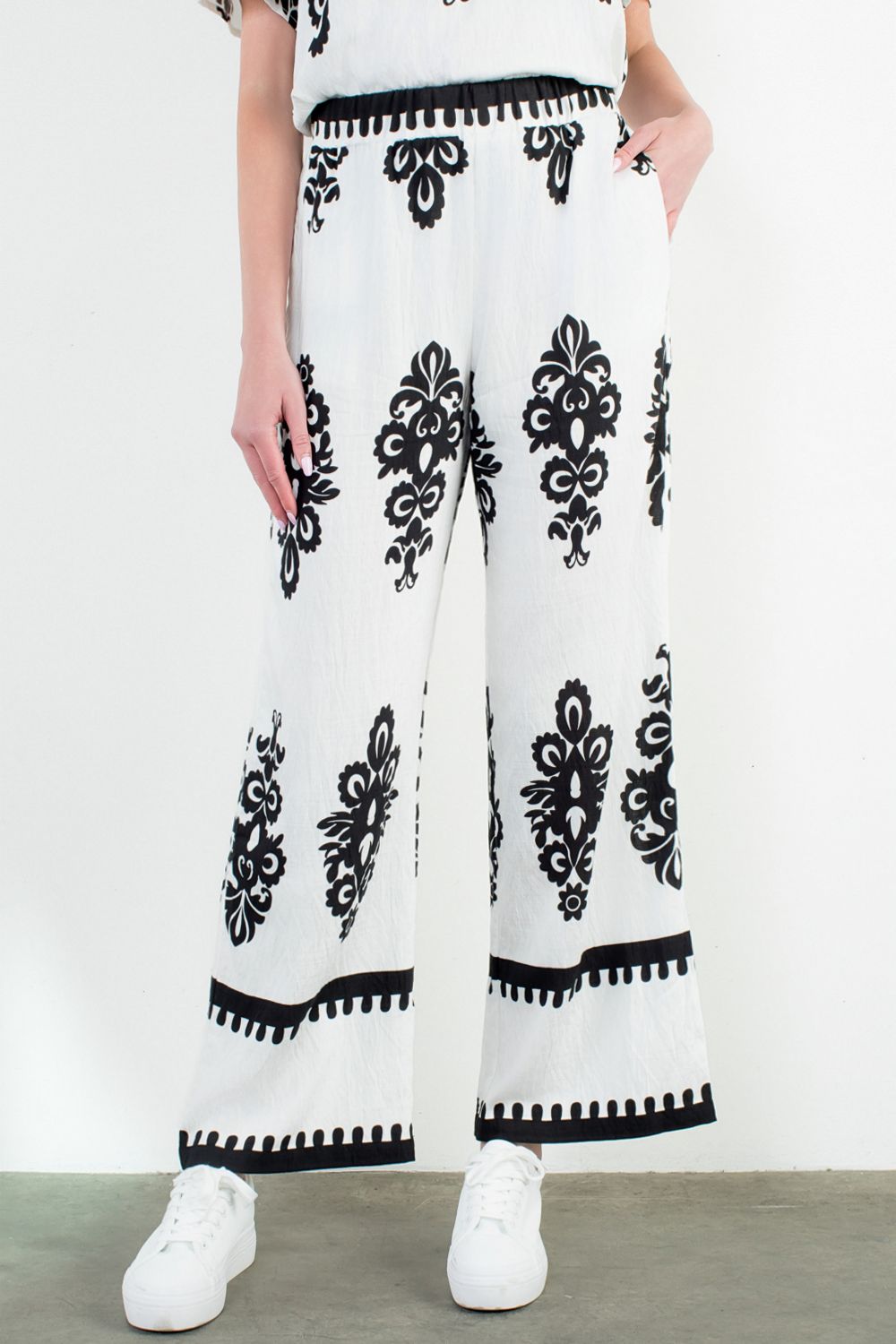 WIDE LEG PRINT PANTS styled for an elevated vacation-ready look
