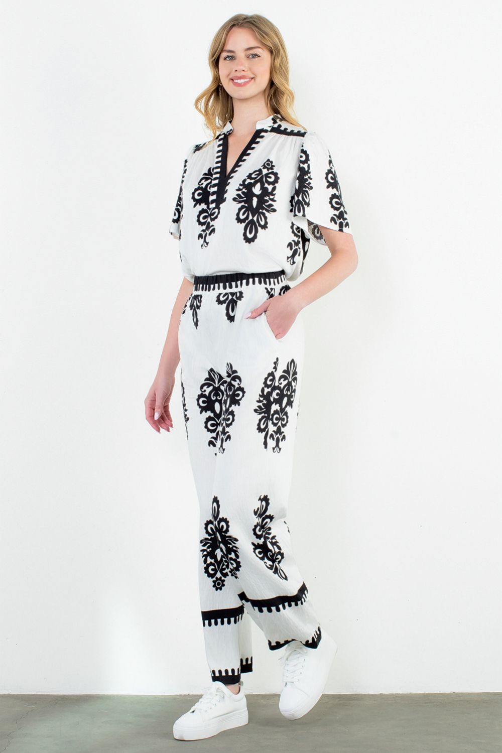 Front view of STMT BOUTIQUE WIDE LEG PRINT PANTS